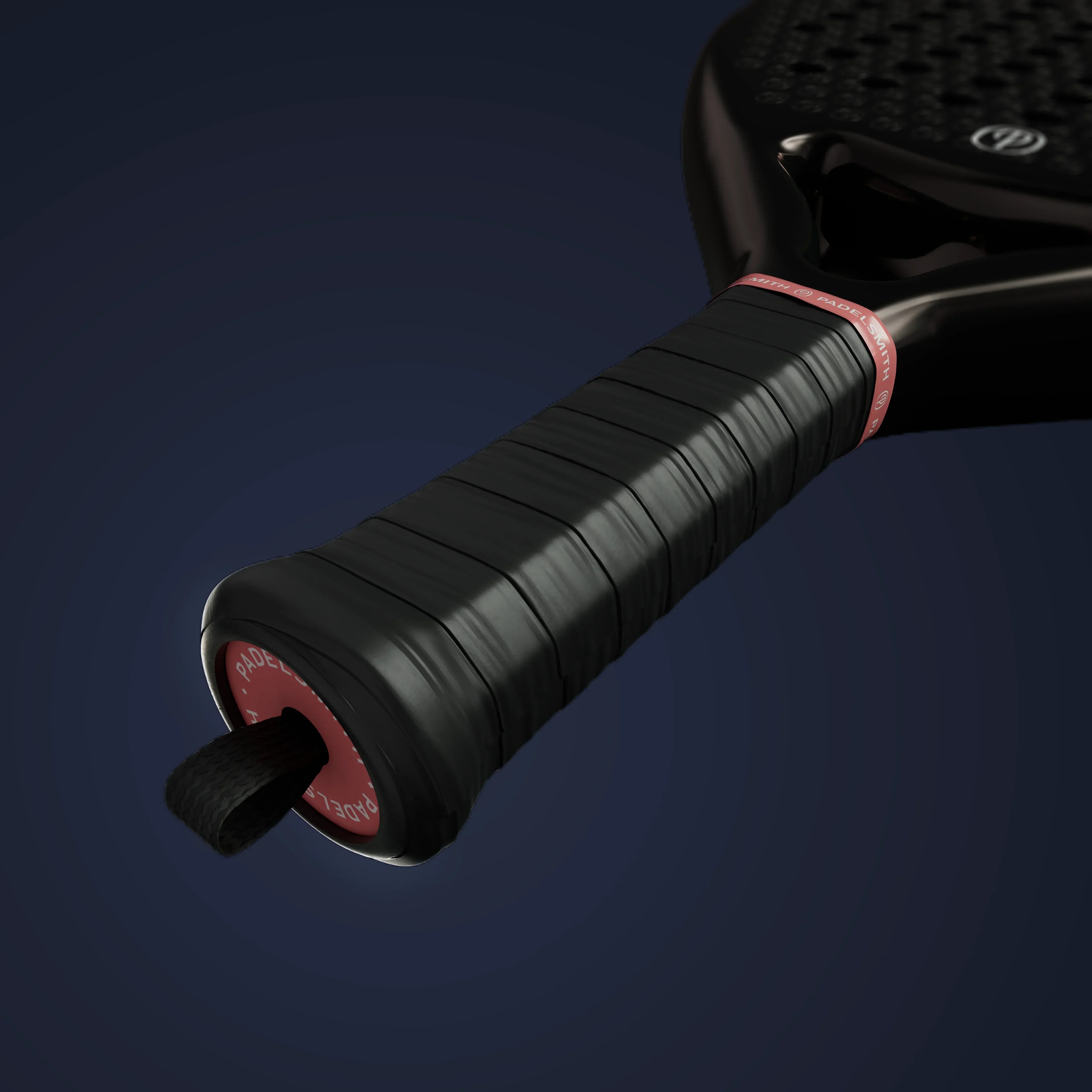 Close-up of a black padel racket handle with detailed textured grip on a dark background