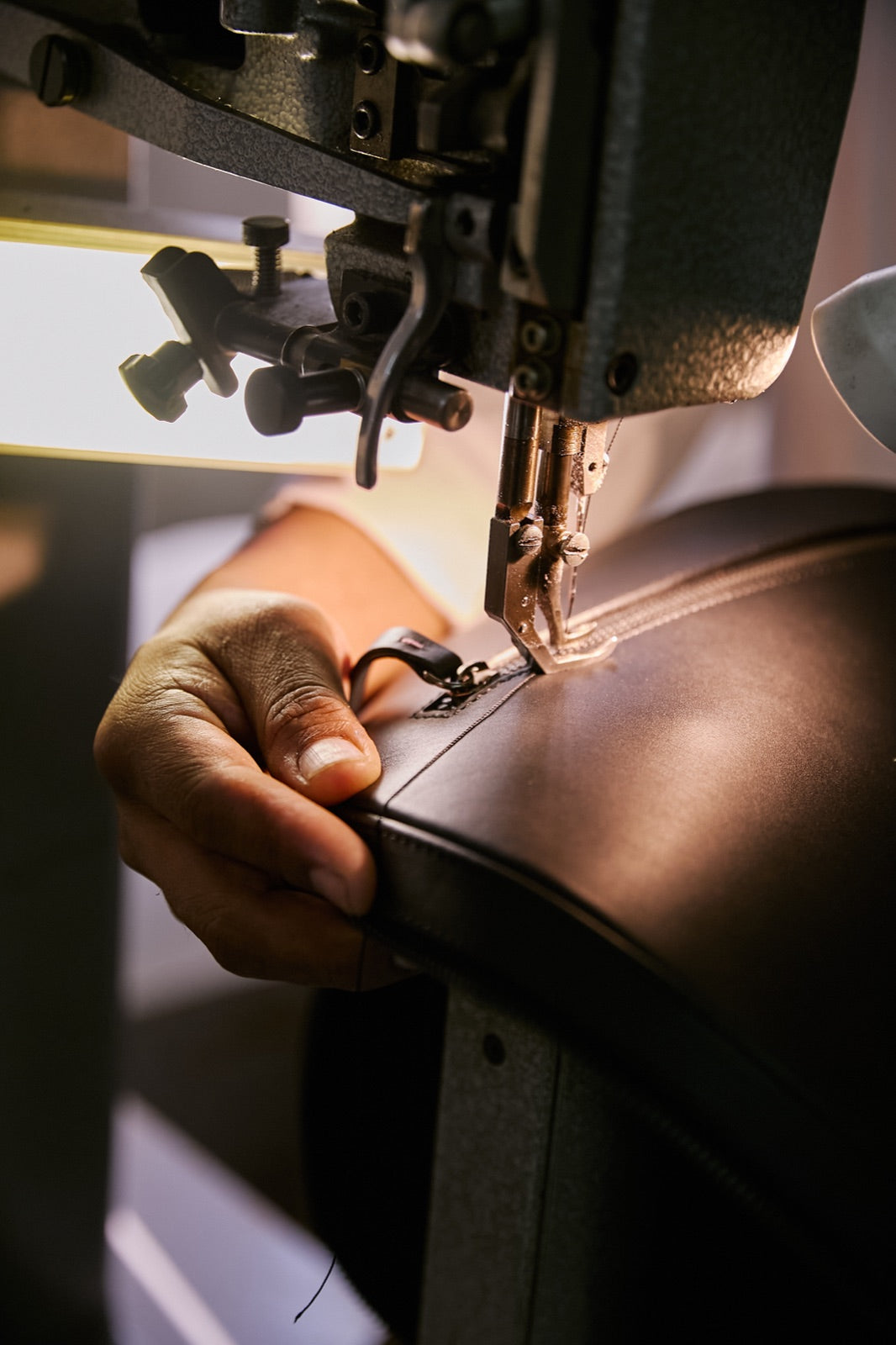 Machine-stitching the curved edge of The Padelsmith Cover