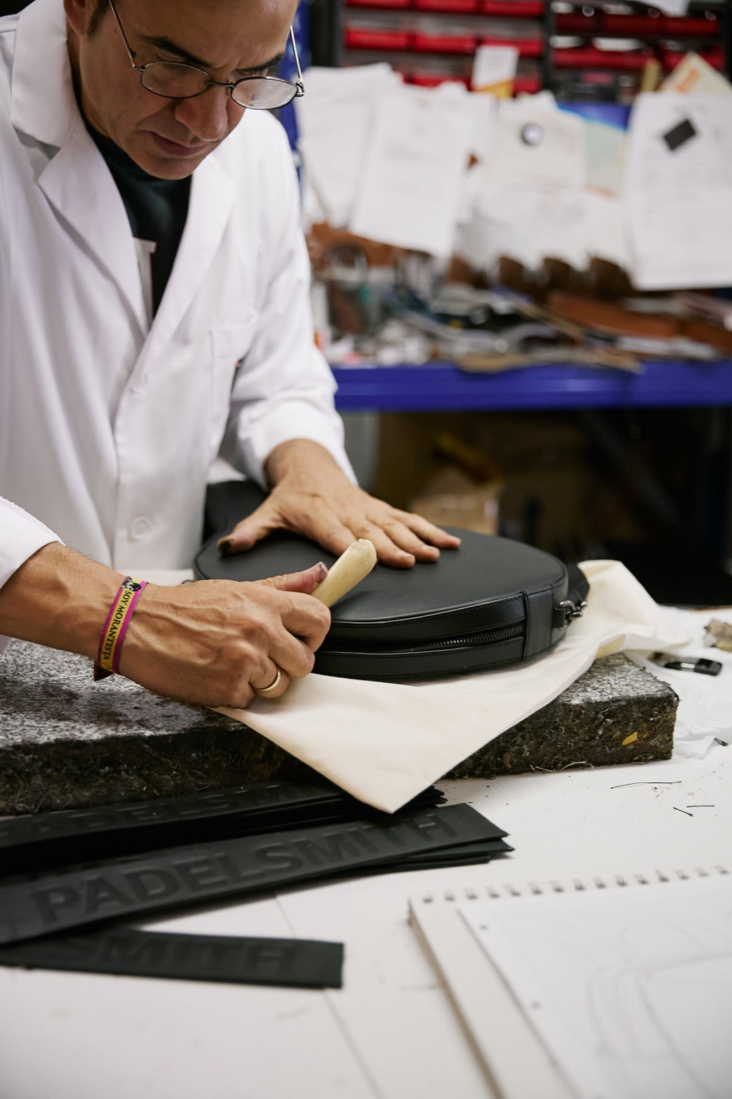 Hand-moulding The Padelsmith Cover over the form