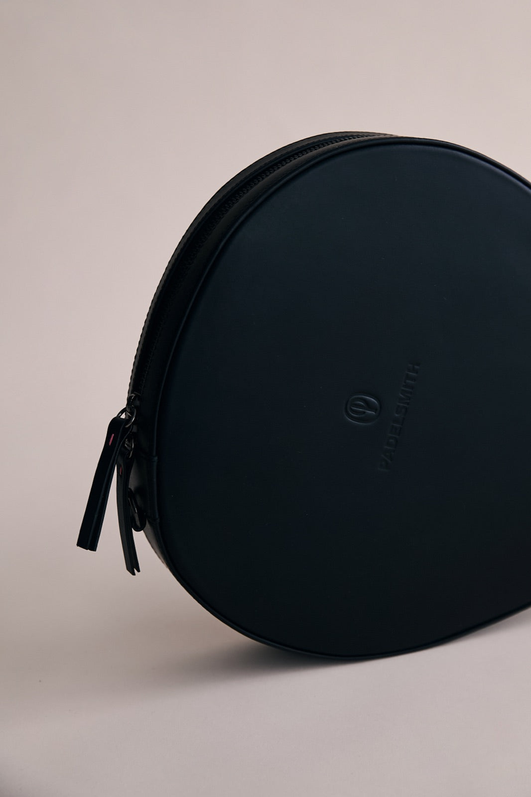 The Padelsmith Cover with the debossed Padelsmith mark and zip